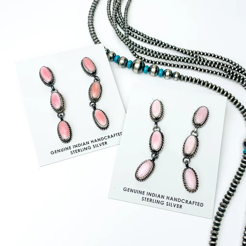 Spring floral earringsFreda Martinez | Navajo Handmade Sterling Silver Oval Drop Earrings with Three Pink Conch Stones