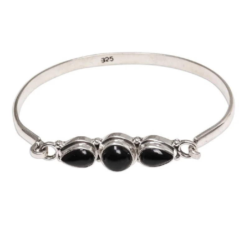 Winter snowflake bracelets  Onyx Bangle Bracelet, 'Vision of Loveliness' (Indonesia) - 7'6" x 9'6"