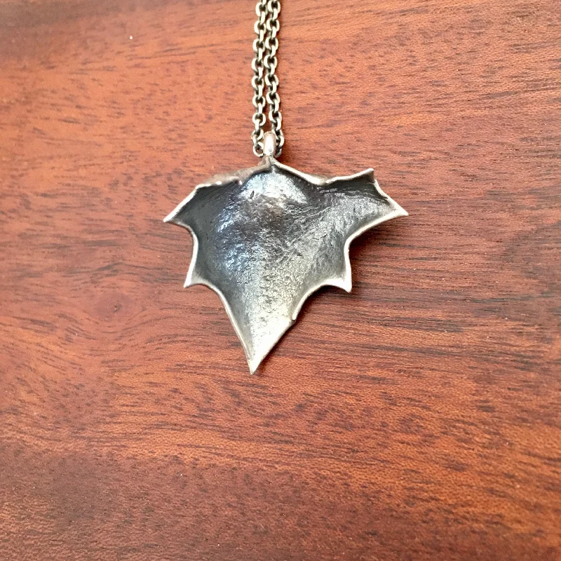 Christmas-themed necklaces  Sterling Silver Succulent Shield Leaf Necklace