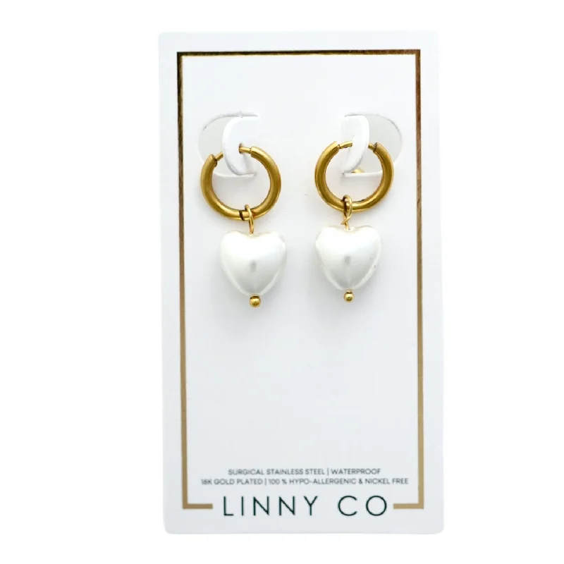 Fashion earrings underLinny Co | Willa Gold Tone Huggie Hoops with Dangling Heart Pearls