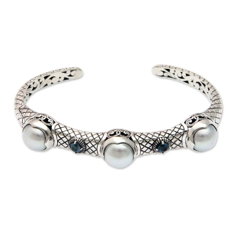 Bold charm bracelets  NOVICA Three Moons, Cultured pearl and blue topaz cuff bracelet