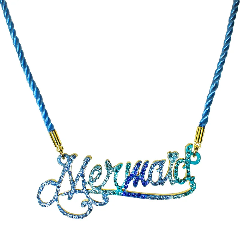 Bold charm necklaces  Mermaid Magic Cord Necklace (Goldtone)